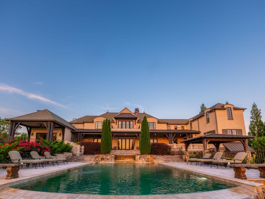 Pool and residence at twilight